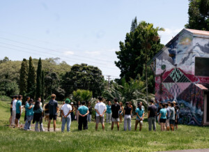 Nalukai Students Stand in a Circle