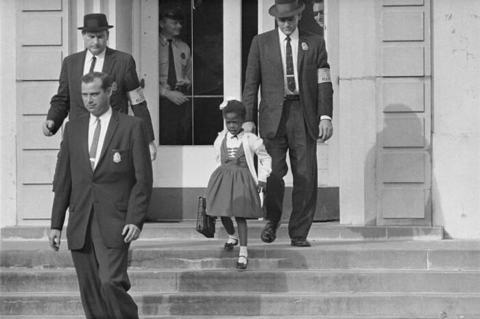 William Frantz Elementary School, New Orleans, 1960. US Marshals with Young Ruby Bridges on School Steps